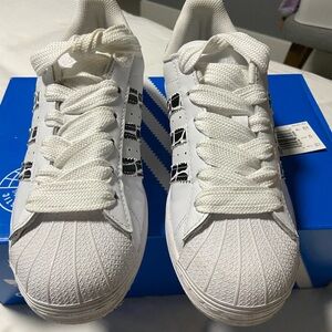 Adidas White Sneakers with Black Patterned Stripes